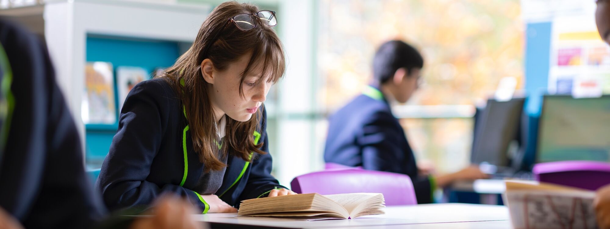 Girl reading in library